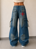Jeans Baggy Fit Svasato con Lavaggio Particolare e Ricami Vintage Y2K - indossata retro