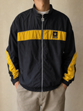 Giacca a vento con zip A Army Nero e giallo Vintage Y2K (M) - indossata fronte