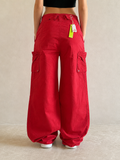 Pantaloni Pantalone Cargo Rosso Super Baggy Fit Cotton Pants Vintage Y2K Donna (XS) - indossata retro
