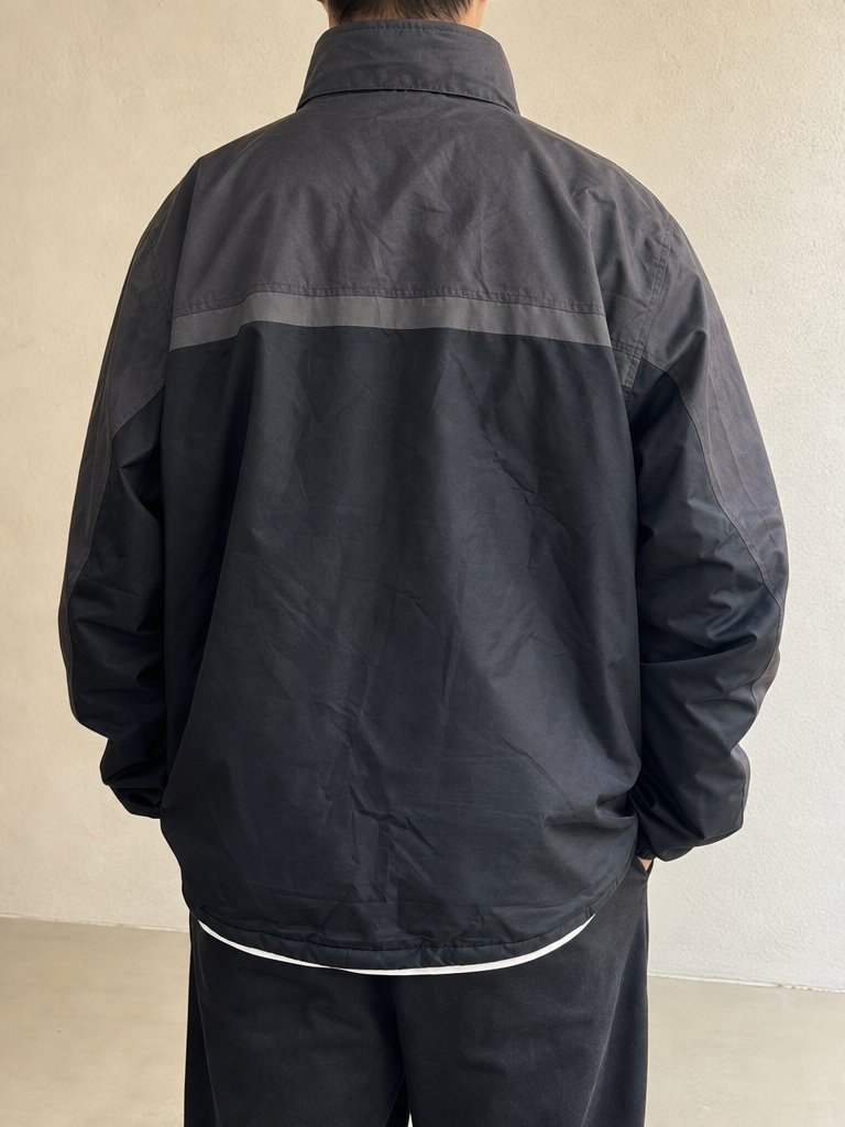 Helly Hansen Giacca Giubbino Helly Hanesn Bicolor Grigio Nero Impermeabile Vintage Y2K Uomo (XXL) - indossata retro