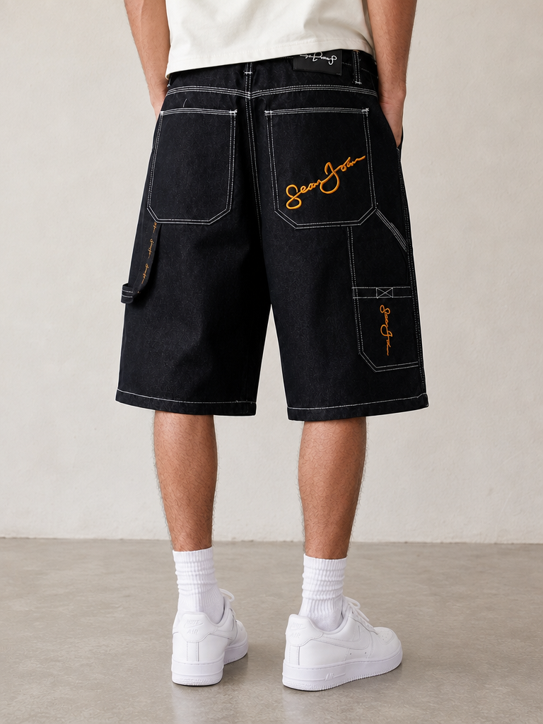 Jeans Denim Rap Jorts Sean John Black Denim Shorts Baggy Fit 90s 2000s American Style Hip-Hop Vintage Y2K Uomo (S) — foto posteriore indossata