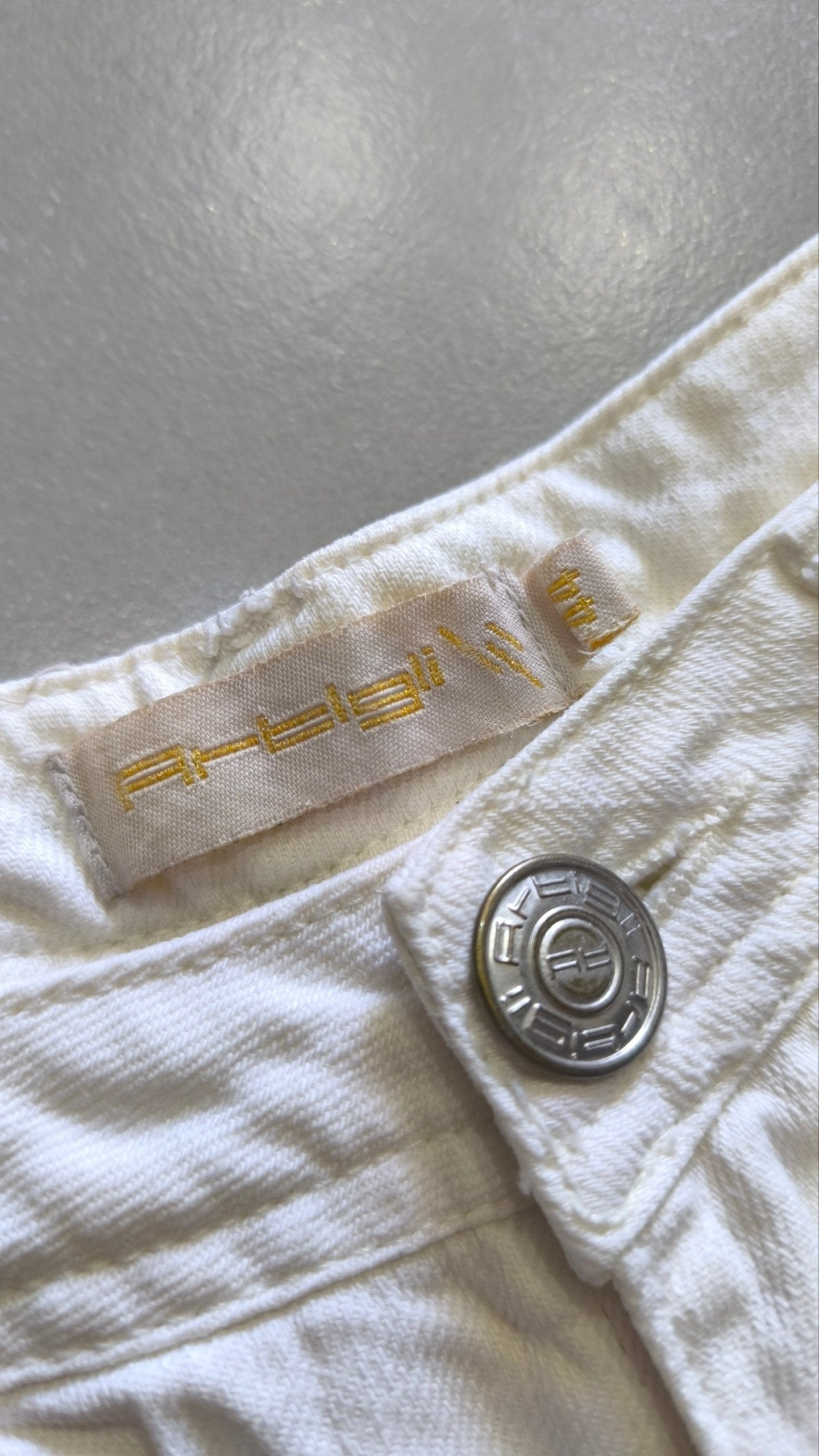 Pantaloncini bianchi donna Y2K vita bassa con zip (M)