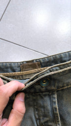 Minigonna jeans grigia Y2K borchie volant vita bassa (M)