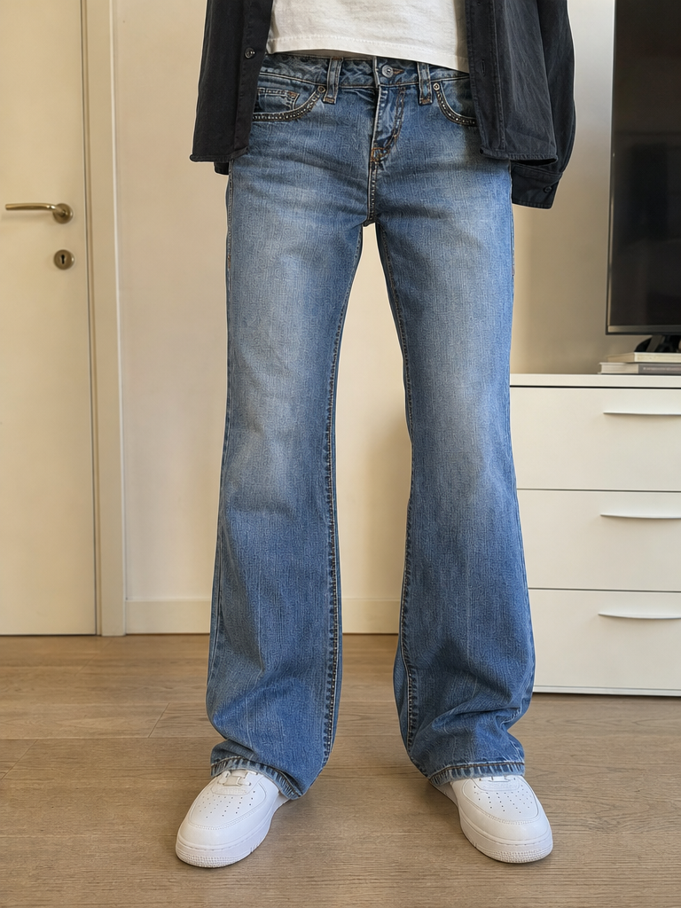 Jeans a zampa Blu denim slavato (S)